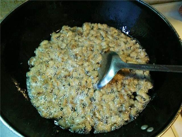青岛油渣的独特魅力，传统美食的传承与家常做法解析