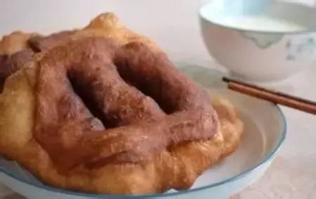 传统美食探秘，炸茧蛹子的美味与营养