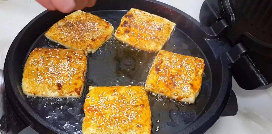 豆腐新吃法，油炸晒豆腐干的魅力与做法解析