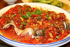 砂锅酸菜鱼头豆腐，酸爽鲜美，温暖每一根味蕾