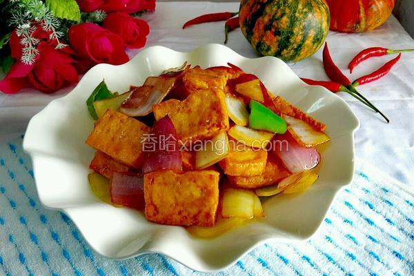 葱头炒油渣豆腐的做法