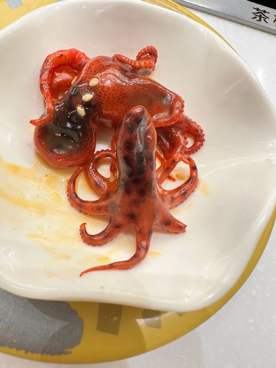 海洋美味探秘，爆头长腿八爪鱼的烹饪艺术